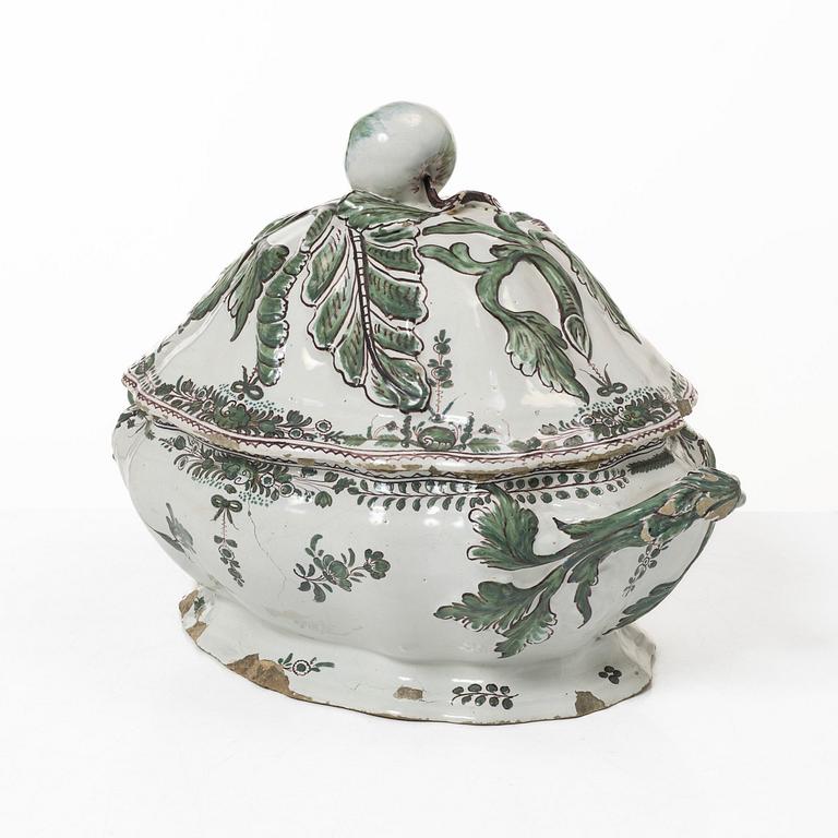 A faience lidded turrine, France, 18th/19th century.