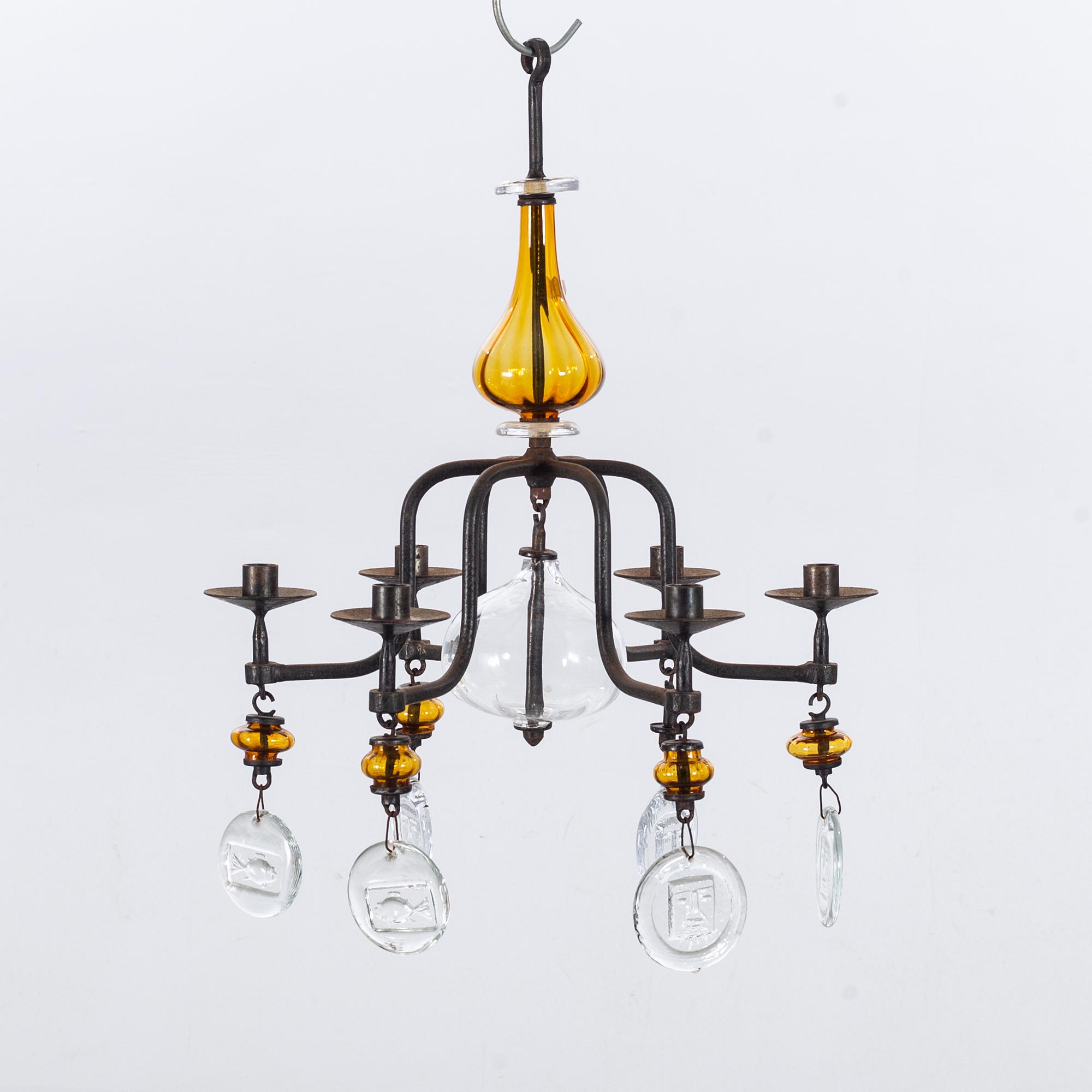 ERIK HÖGLUND,A pair of wall candle holders and a chandelier, kosta Boda, second half of the 20th century.