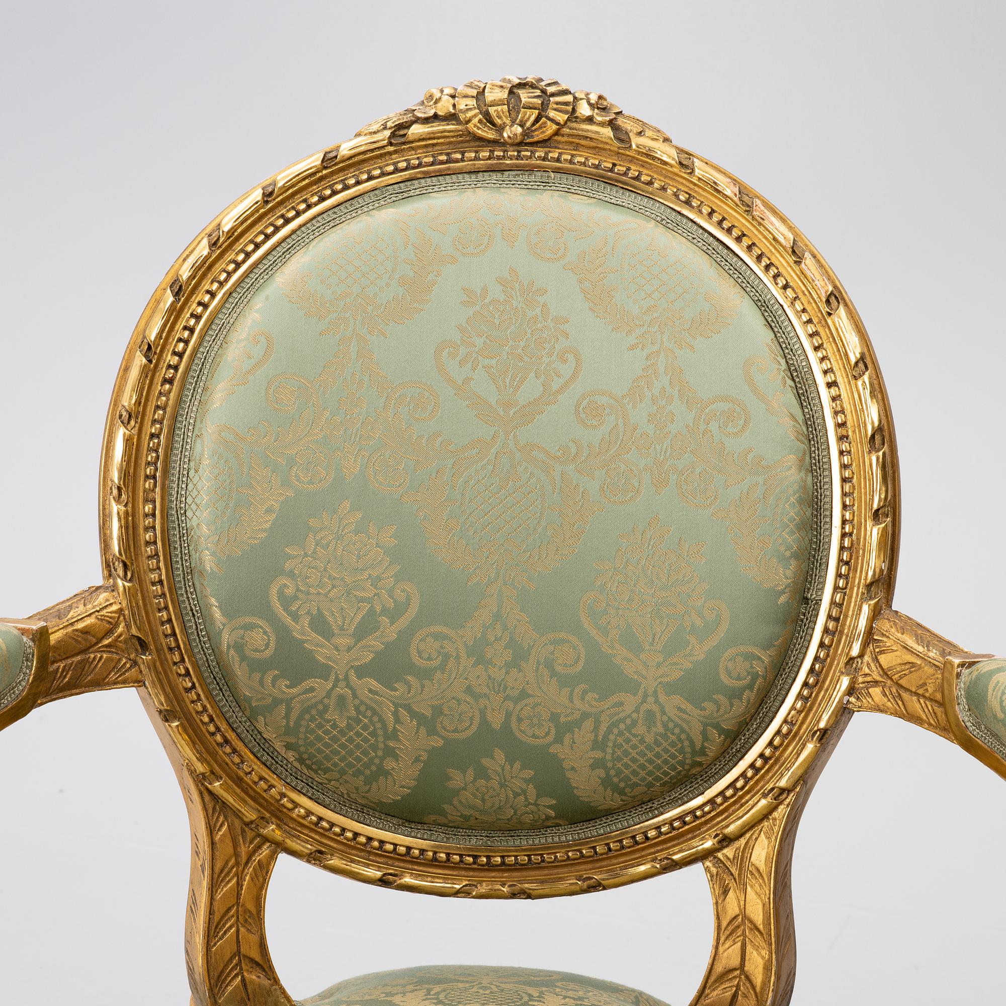 A pair of armchairs, Gustavian style, early 20th century.