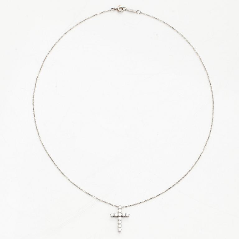 Tiffany & Co, a platinum cross pendant necklace with brilliant-cut diamonds.