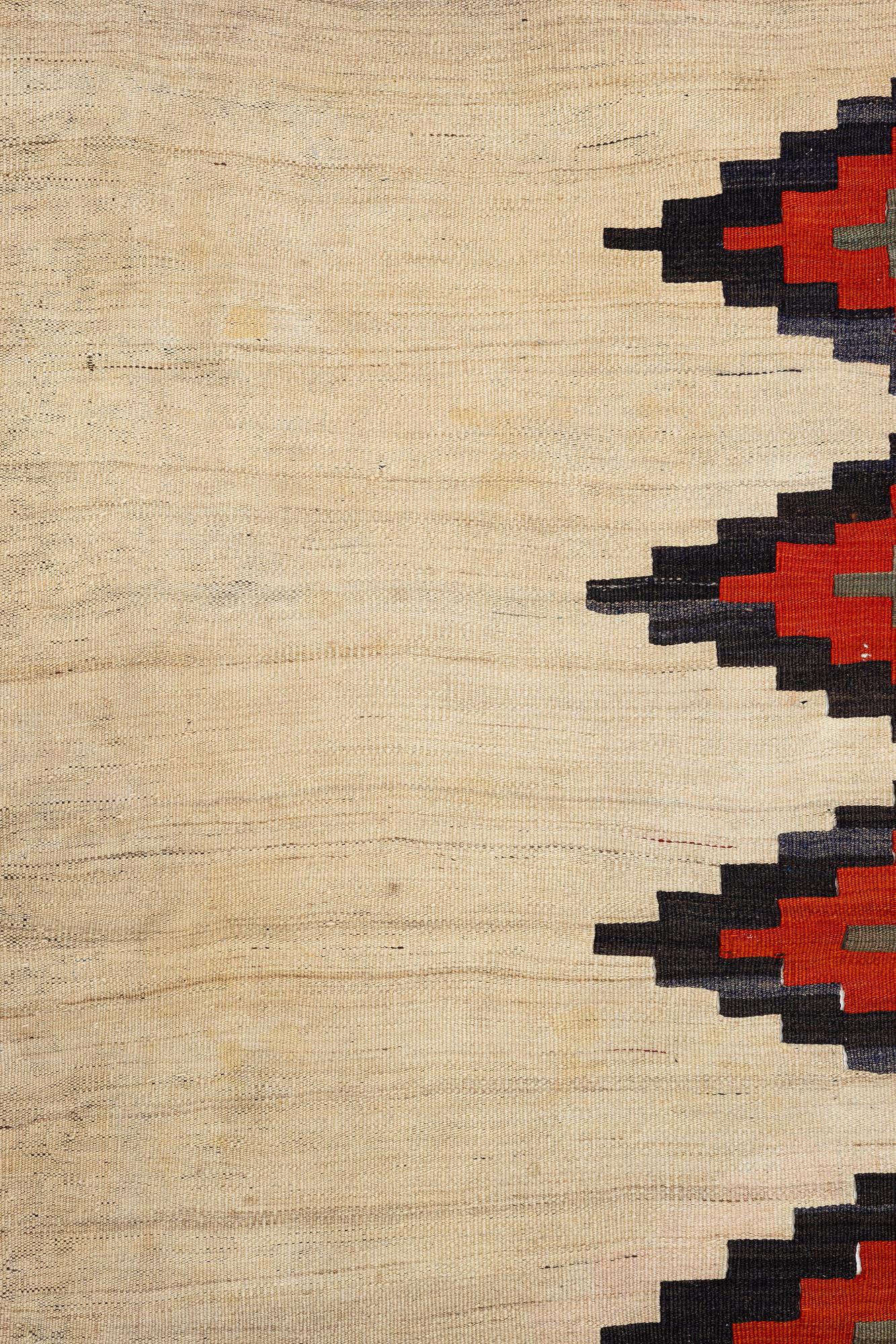 A semi-antique Qashqai kilim, c. 350 x 188 cm.