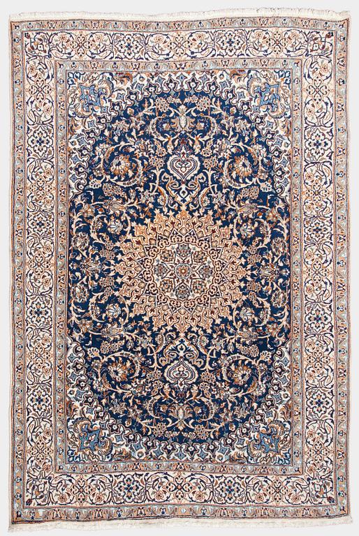A carpet, Nain, part silk, ca. 295 x 201 cm.