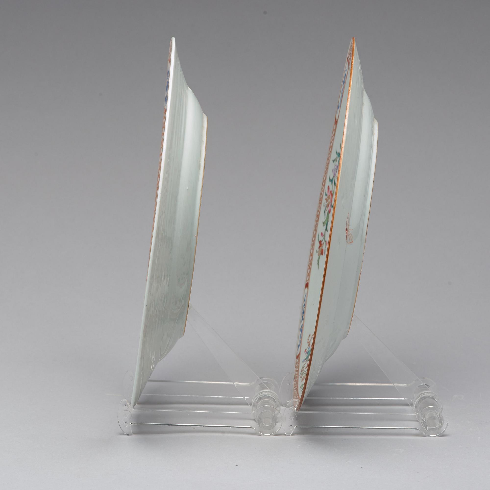 A pair of famille rose 'double peacock' dishes, Qing dynasty, Qianlong (1736-95).