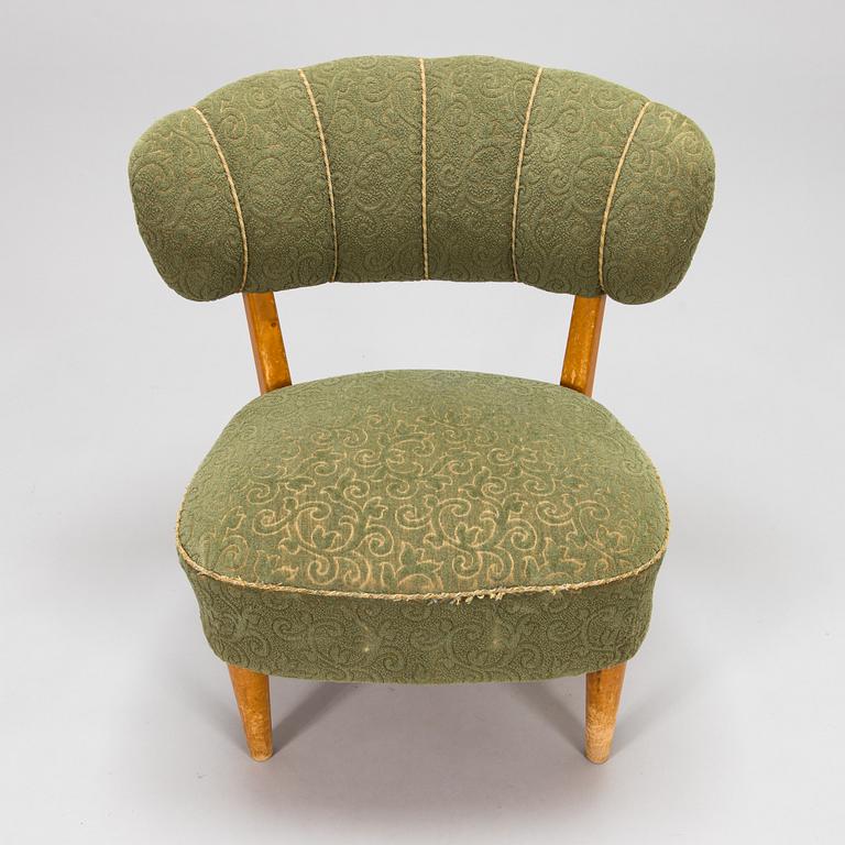 Lisa Johansson-Pape, a 1940's armchair for  Keravan Puusepäntehdas, Stockmann.