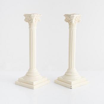 A pair of creamware candlesticks, around 1900.