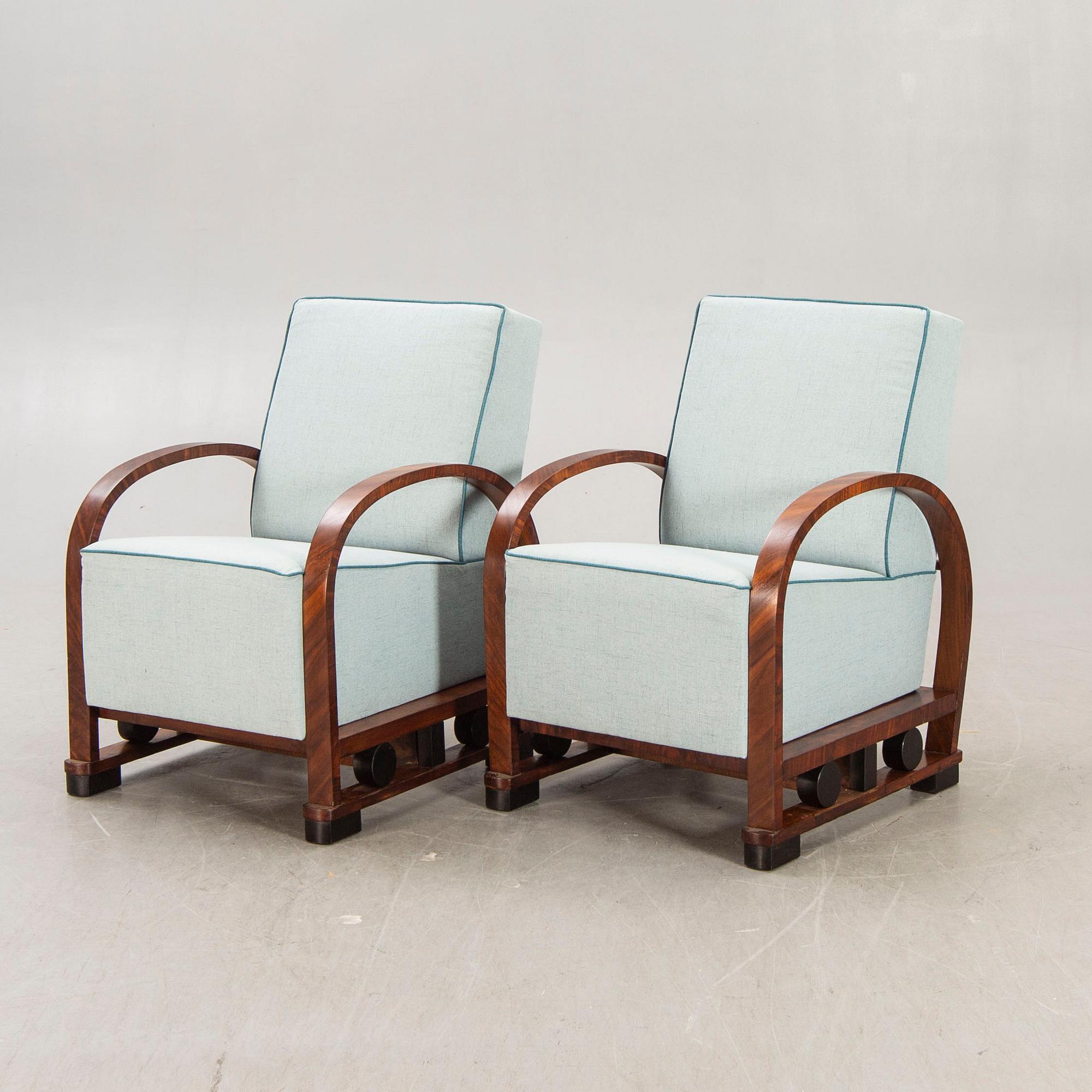 A pair of Art deco walnut armchairs first half of the 20th century.
