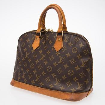 A monogram canvas hand bag "Alma" by Louis Vuitton.