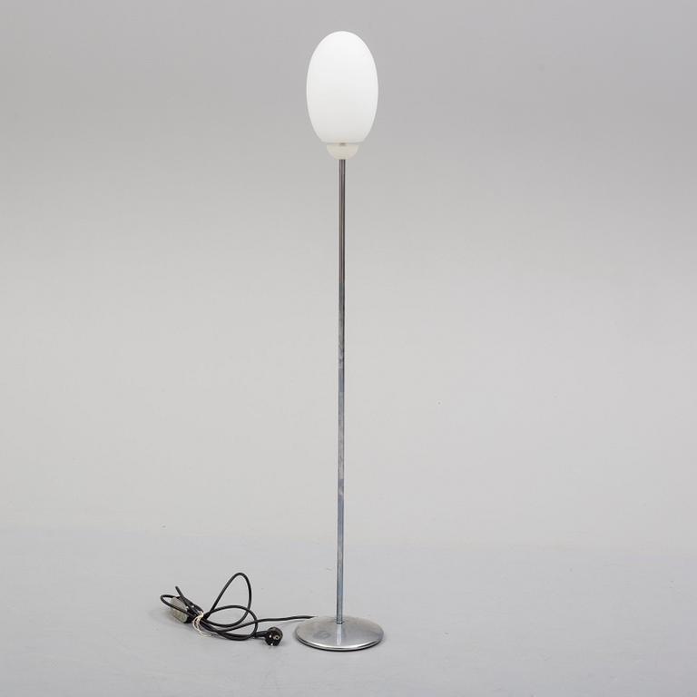 An end of the 20th century floor light by Flos, Italy.