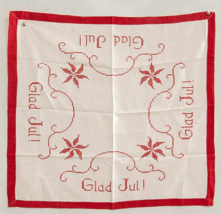 A collection of Christmas tablecloths 12 pcs first half/mid 20th century.