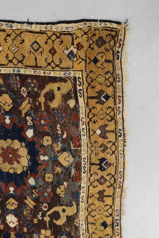 A carpet, fragment, an antique Karabagh 18th century, ca 293-300,5 x 202,5-205,5 cm.