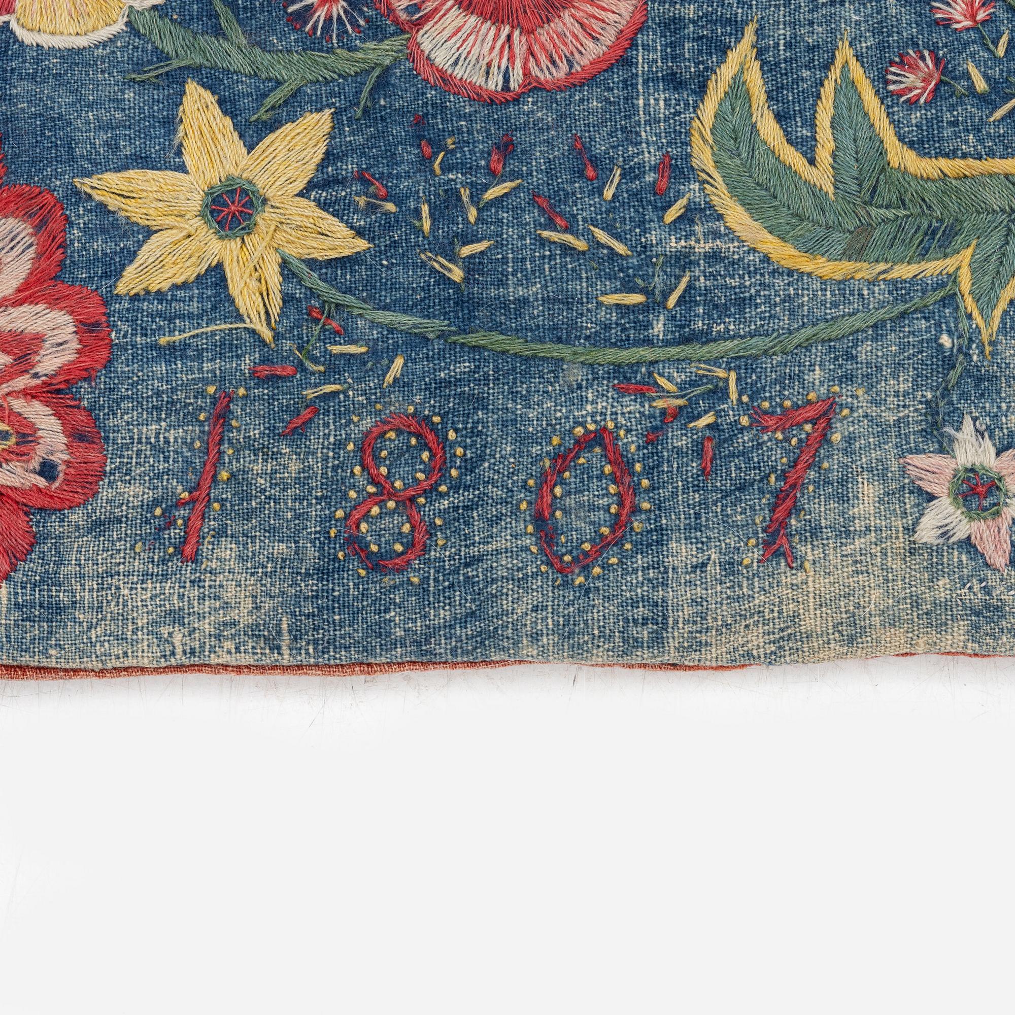 A flat weave carrige cushion, c. 99 x 54 cm, Wemmenhög district, Scania, Sweden, signed and dated DAD 1807.