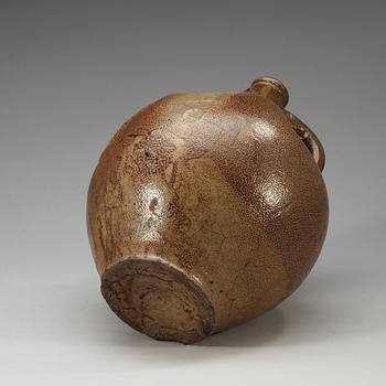 A large salt-glazed stoneware 'Bartman jug', 17th Century.