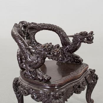 A Chinese 20th century wooden armchair.