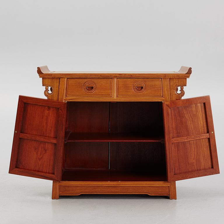 A Chinese hardwood cabinet, second half of the 20th century.