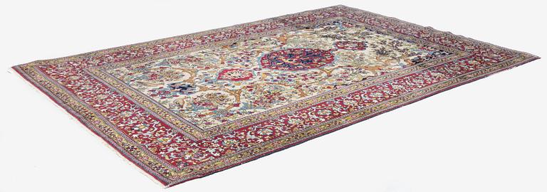 An antique Isfahan rug, Central Persia, c. 219 x 143 cm.