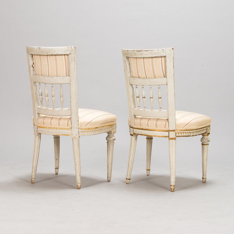 A pair of gustavian chairs made in Lindome by Johannes Andersson (1763-1840), signed IAS+, around the year 1800.