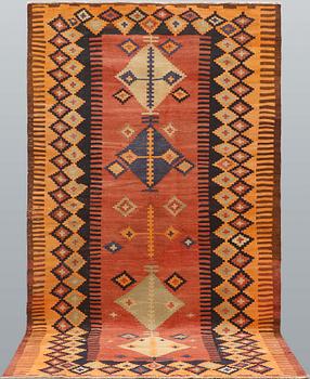 A kurdish kilim carpet, ca 320 x 180 cm.