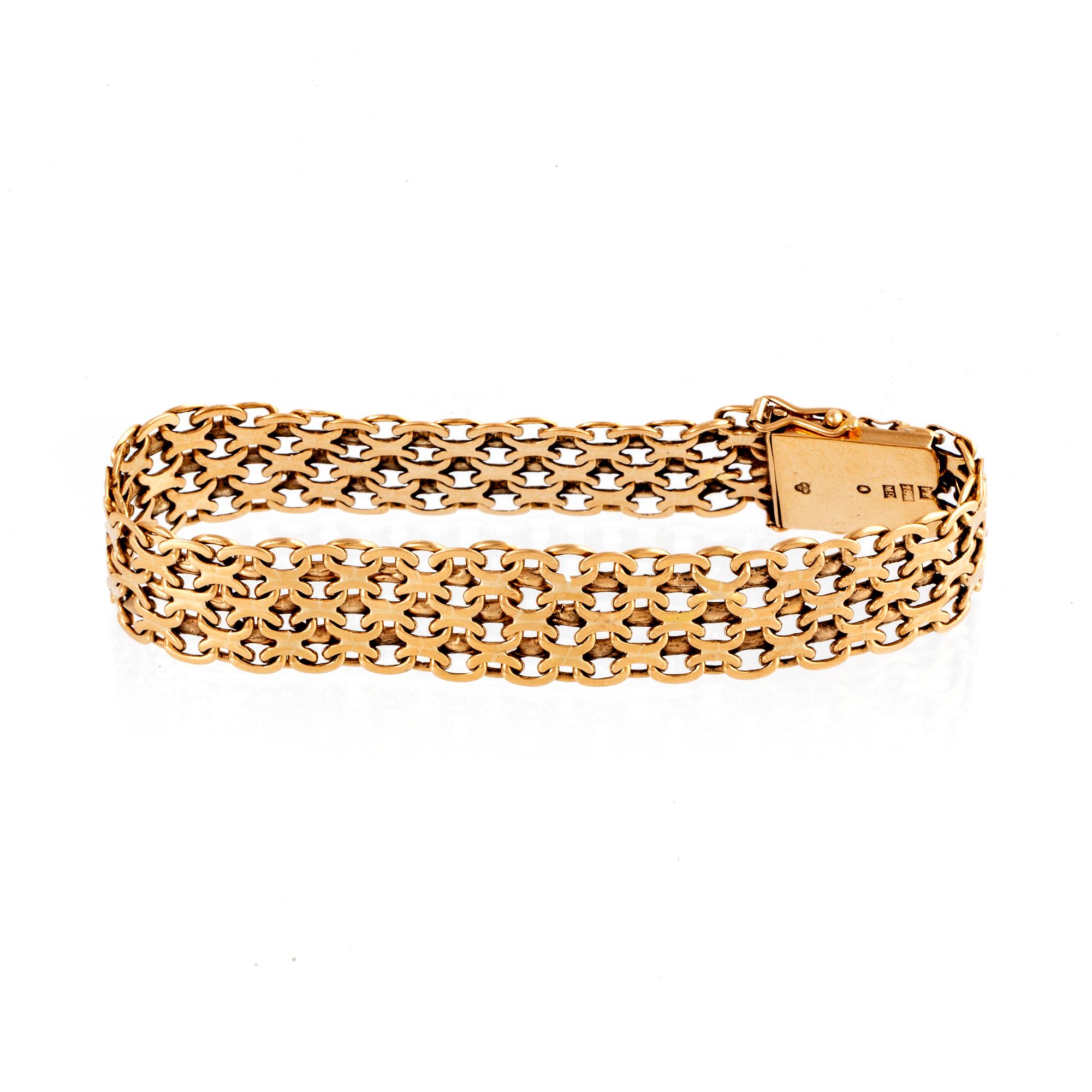 Armband 18K guld X-länk Stockholm 1962.