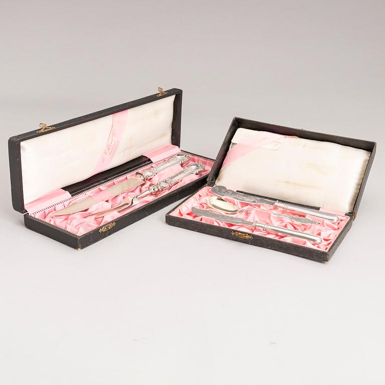 Silver serving cutlery, three with mark of Ferdinand Timper, Helsinki 1901-02 and a pair with German marks, ca. 1900.