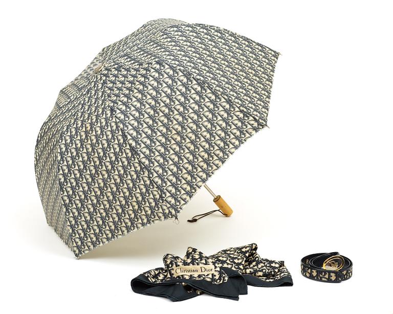 A belt, umbrella and scarf by Christian Dior.
