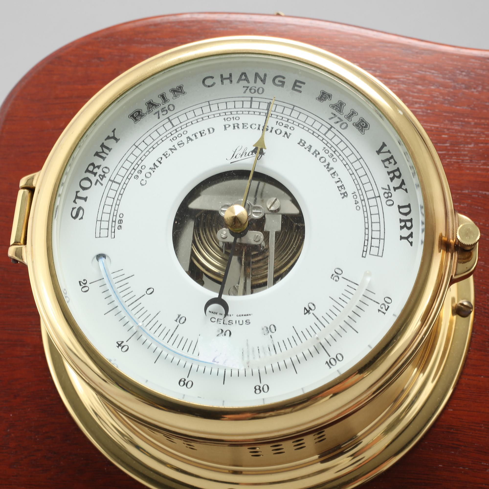 A wall clock and a barometer from Schatz.