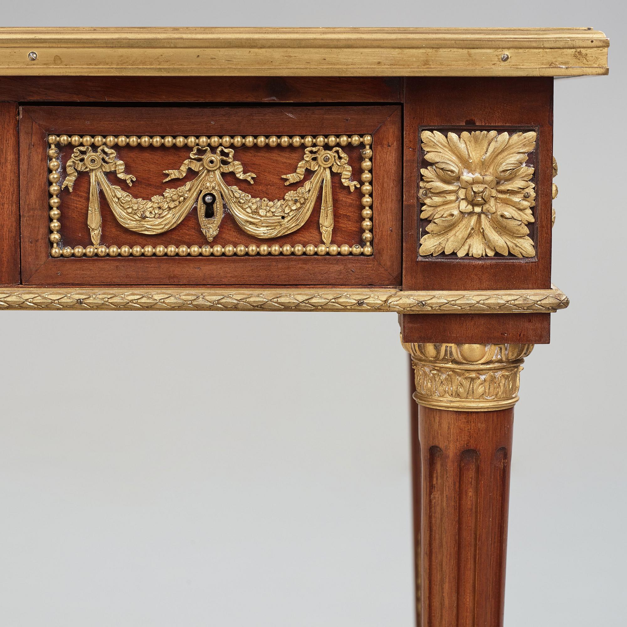 A Louis XVI-style late 19th century table.