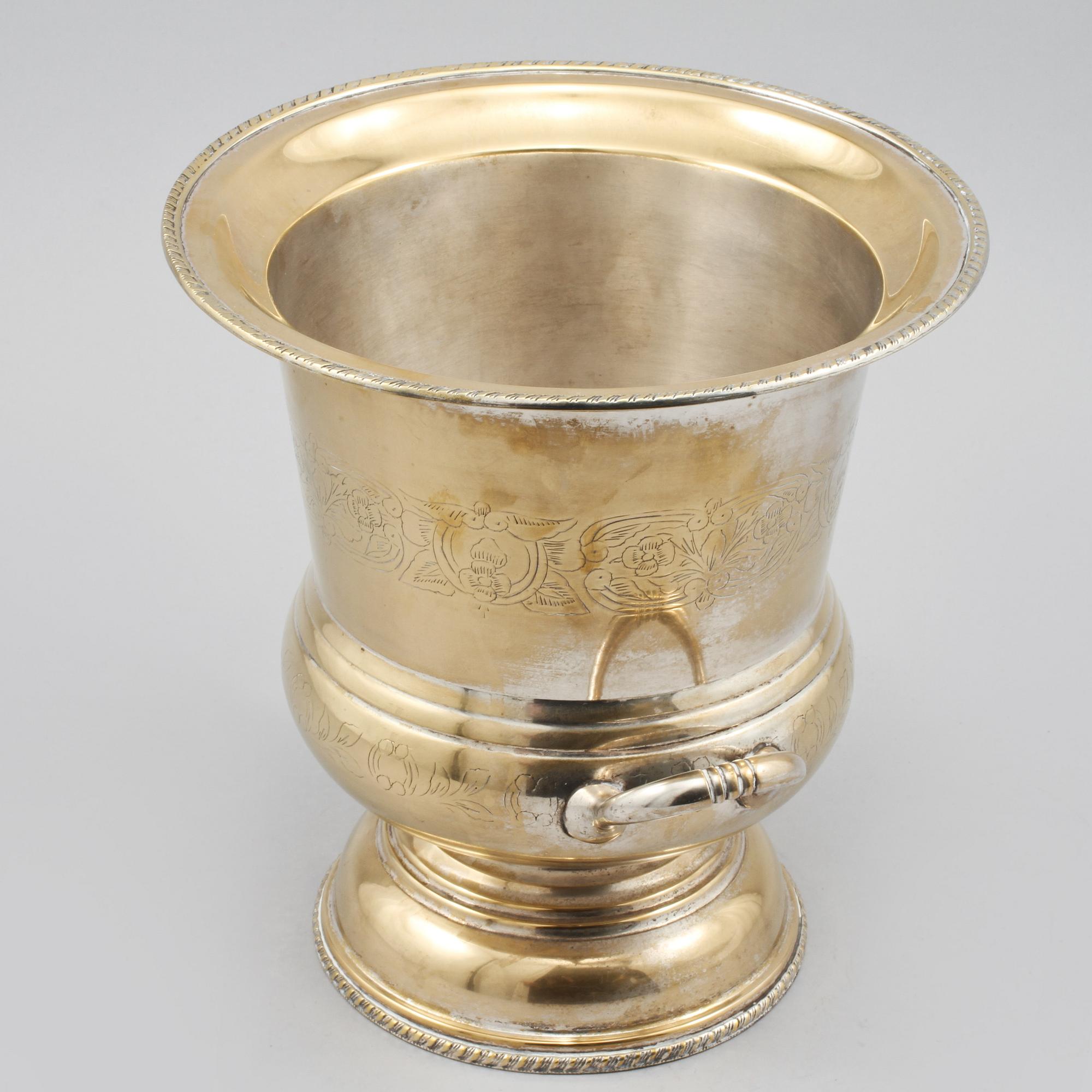 CHAMPAGNEKYLARE, vitmetall, omkring 1900-talets mitt.