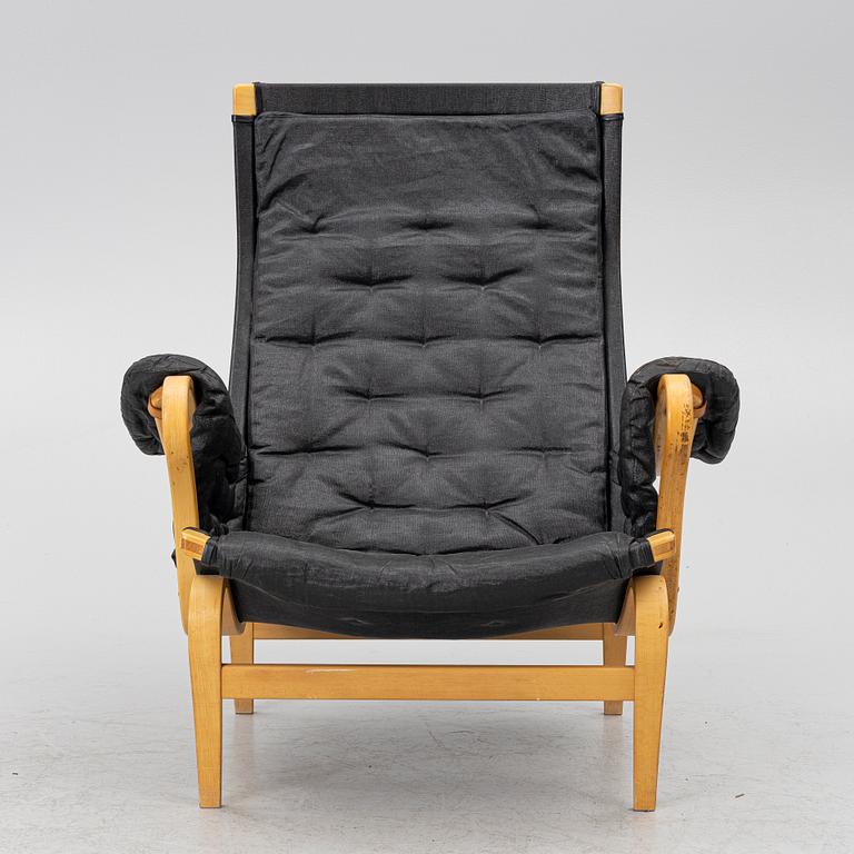 Bruno Mathsson, a 'Pernilla' armchair, Dux, Sweden, later part of the 20th century.