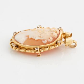 Pendant/brooch in 18K gold with a shell cameo and white stones.