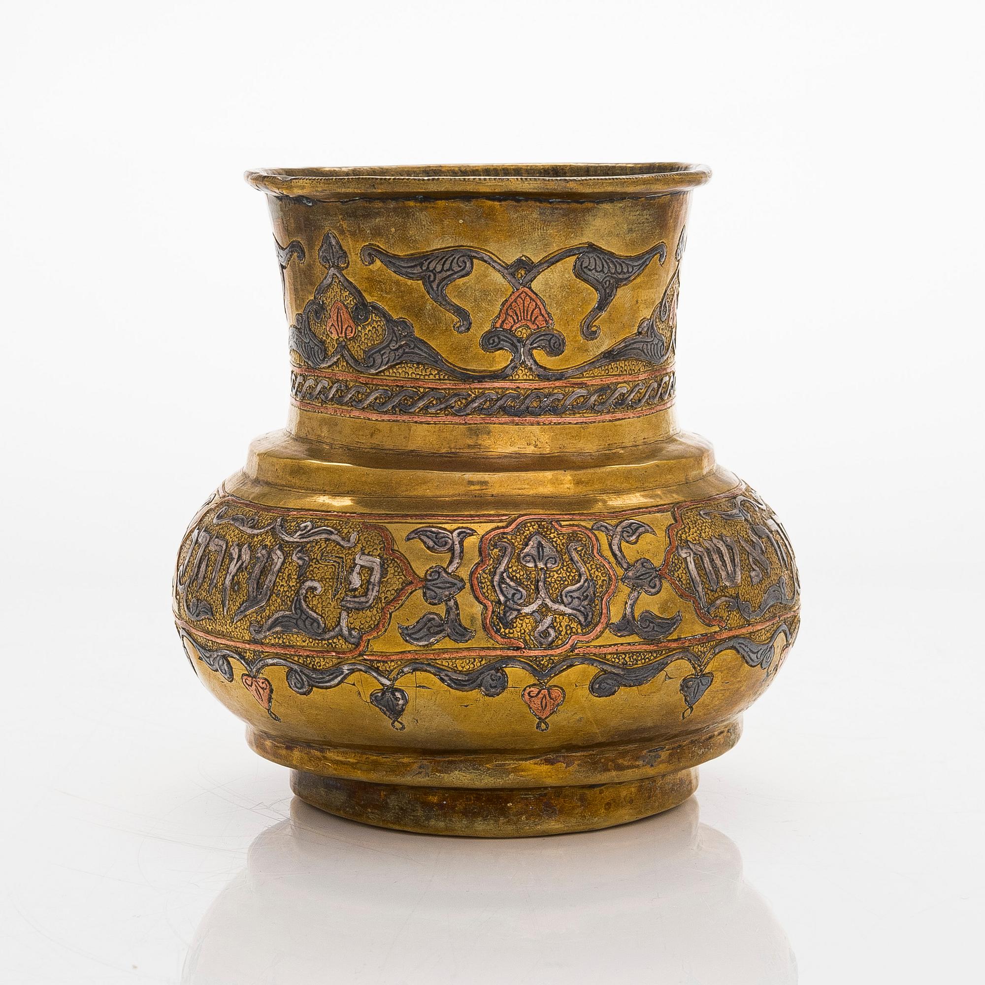 A Judaica vase in brass, copper and silver. Cairo ware with hebrew text. Egypt/Syria, turn of the 19th/20th century.