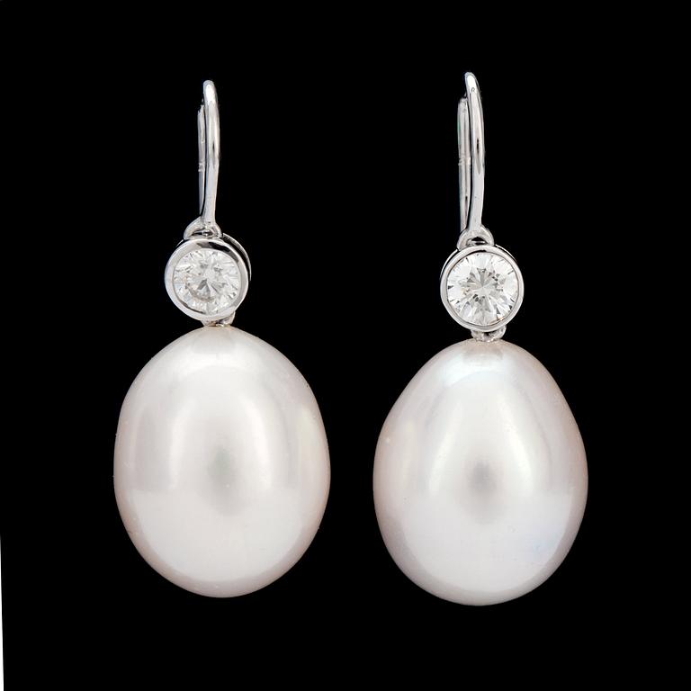 A pair of cultivated pearl and brilliant-cut, 0.42 ct in total, diamond earrings.