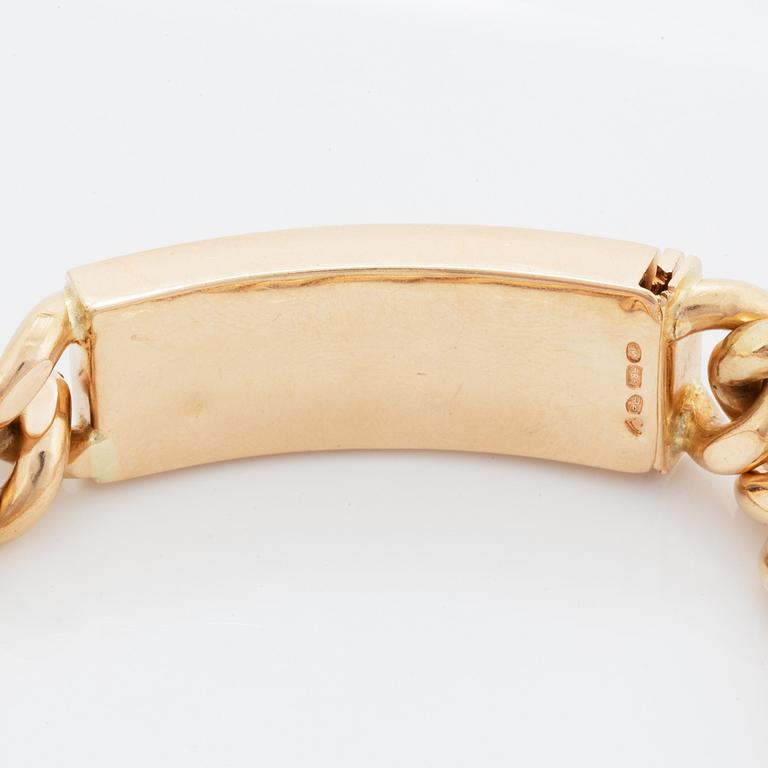 A 14K gold bracelet.