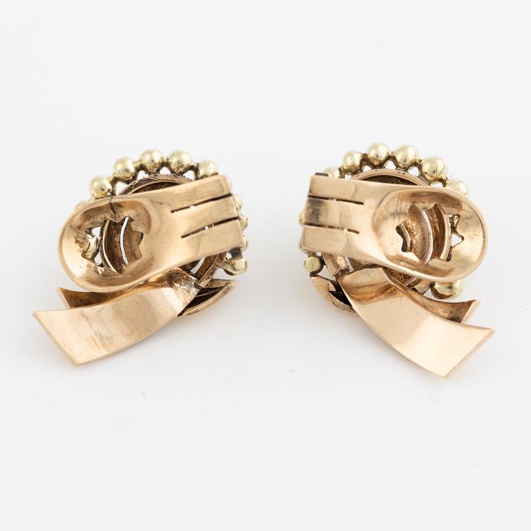 A pair of earrings in 14K gold set with old-cut diamonds.