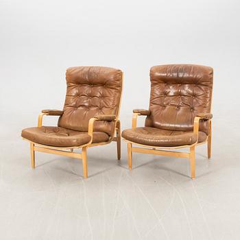 Bruno Mathsson, a pair of "Ingrid" armchairs for DUX, late 20th century.