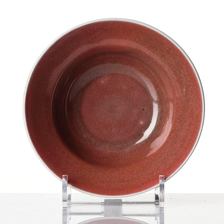 A red glazed bowl, Qing dynasty, 18th century.