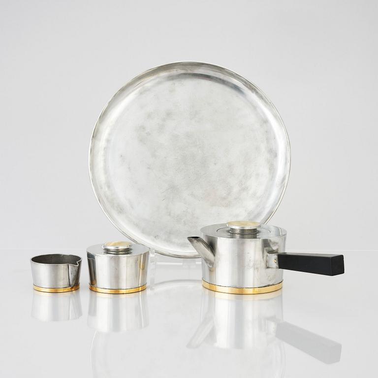 Nils Fougstedt, a pewter and brass 3 pcs tea service, Svenskt Tenn, Stockholm 1930-32-1934.