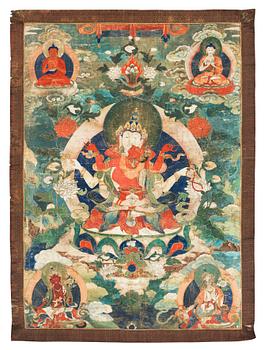 A rare Bon thangka depicting a deity with consort, presumably Southern/Western China, around 1900.