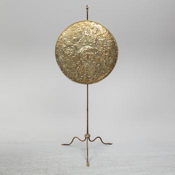 A 19th century brass fire guard.