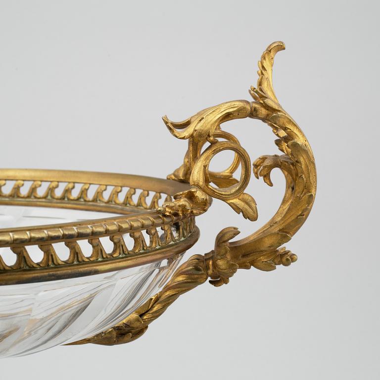 A LOUIS SEIZE STYLE  ORMOLU JARDINIERE, first half of the 19th century.