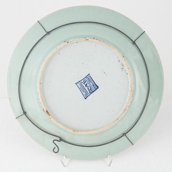 A Kanton porcelain dish and two porcelain plates, China, 19th century.