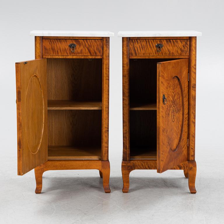 A pair of bedside tables, early 20th century.
