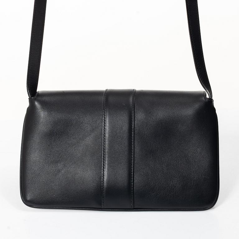 Gucci, a handbag.