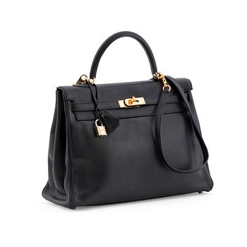 525. HERMÈS, a black calf leather handbag, "Kelly 35".