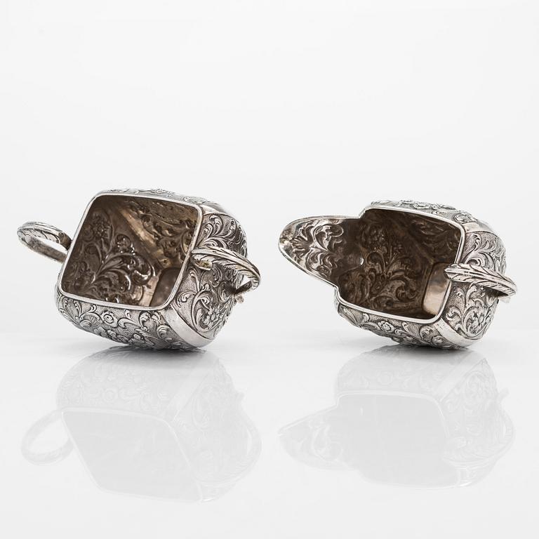 A 1940s Dutch silver sugar bowl and cream jug on a tray, Amsterdam, 1947 and 1942.