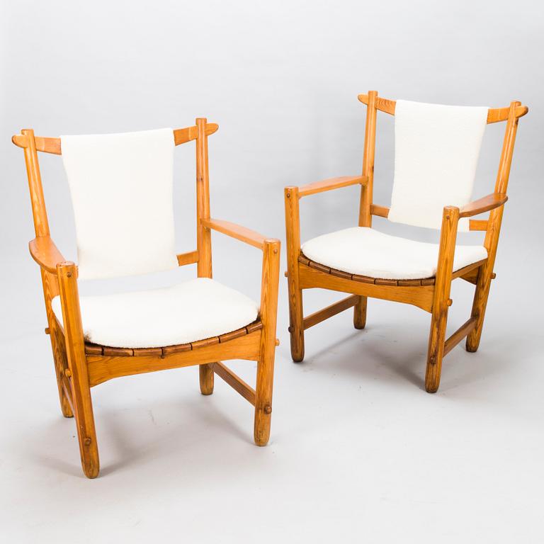 LASSE OLLINKARI, a pair of 1948 open armchairs.