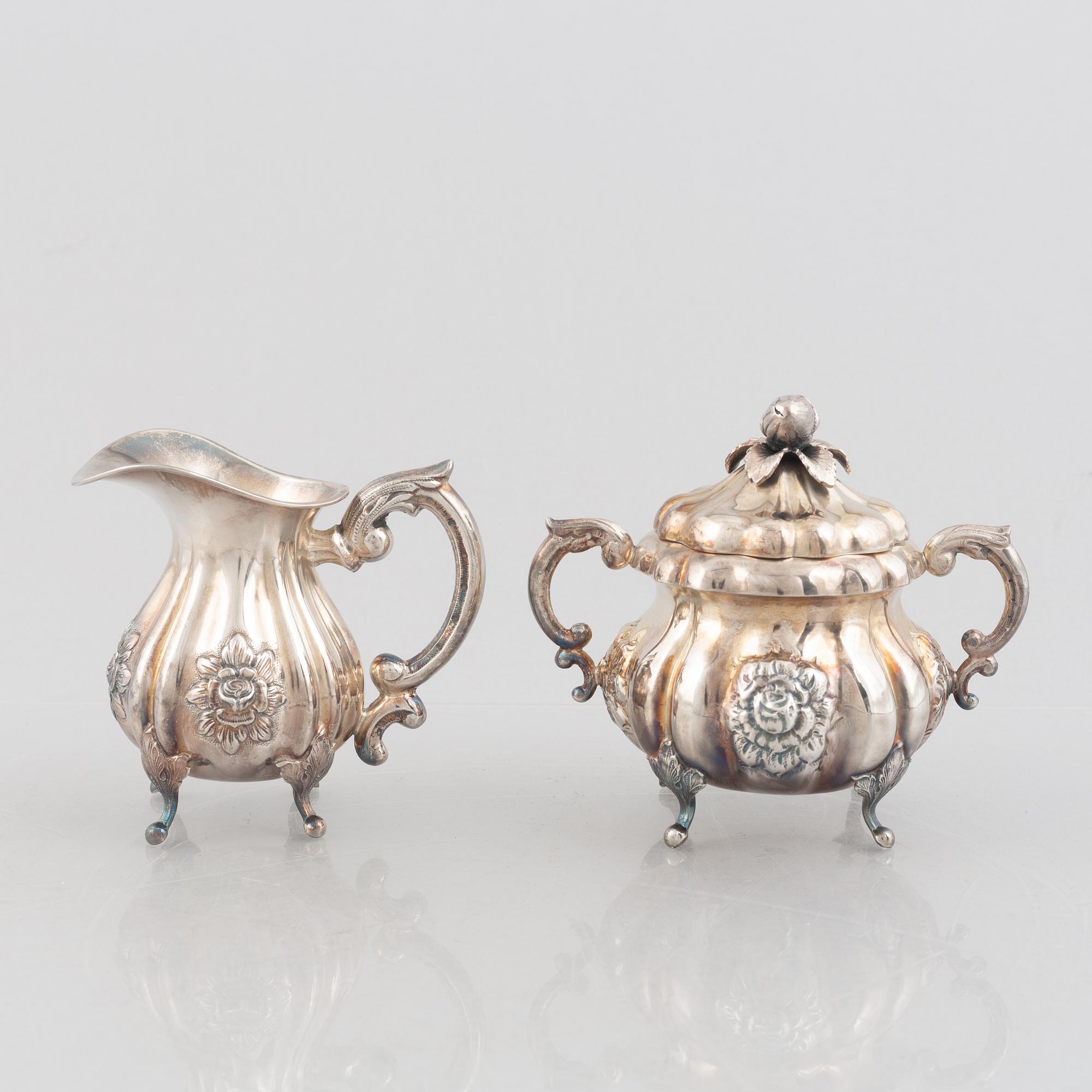 An Austrian silver coffee pot, tea pot, cream jug and sugar bowl, Vienna 1826.