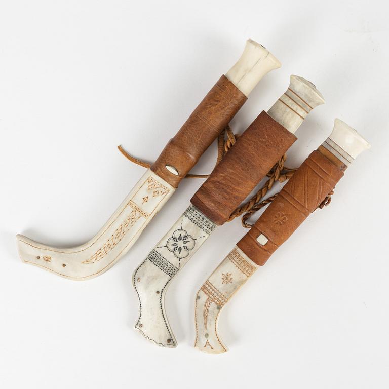 Three reindeer horn knives all signed.