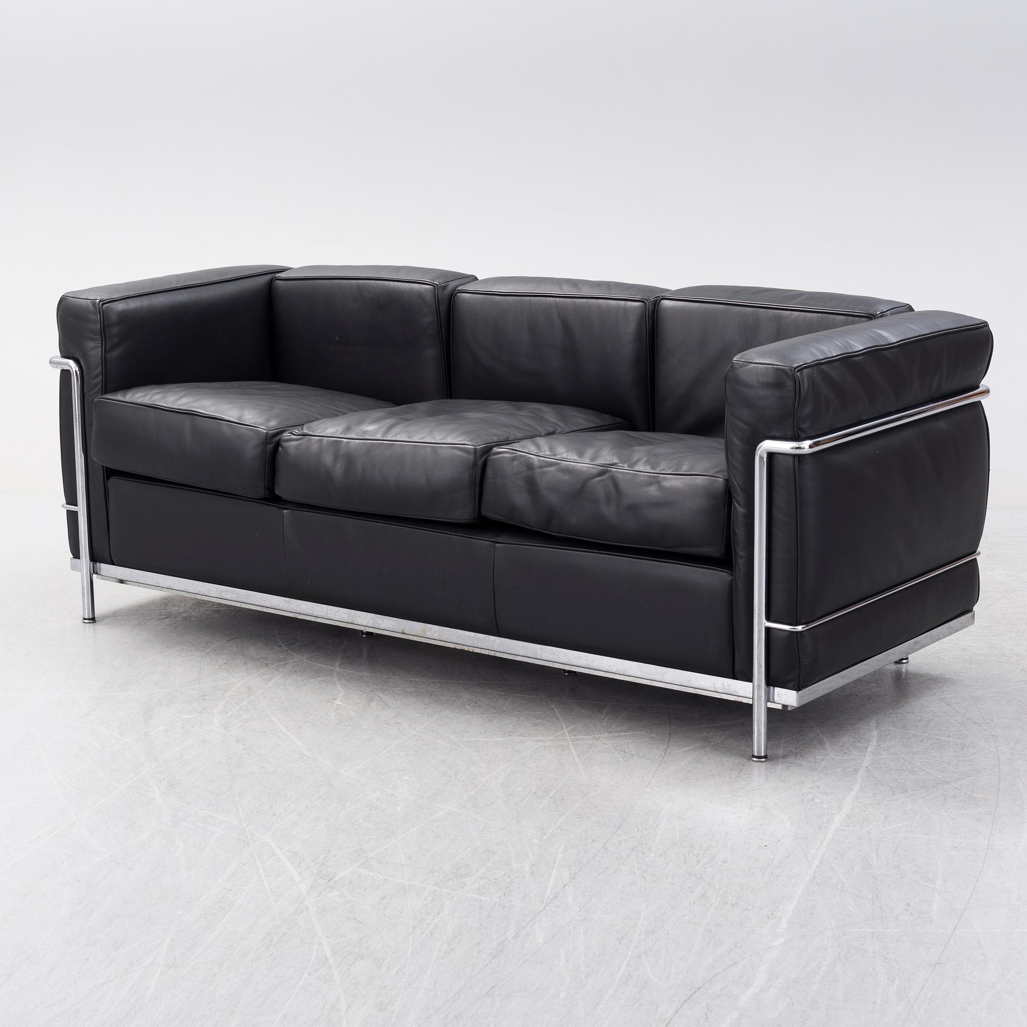 LE CORBUSIER, PIERRE JEANNERET & CHARLOTTE PERRIAND, an 'LC2' sofa from Cassina, Italy.