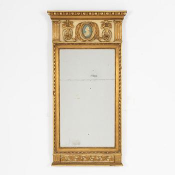 A Gustavian style mirror, circa 1900.
