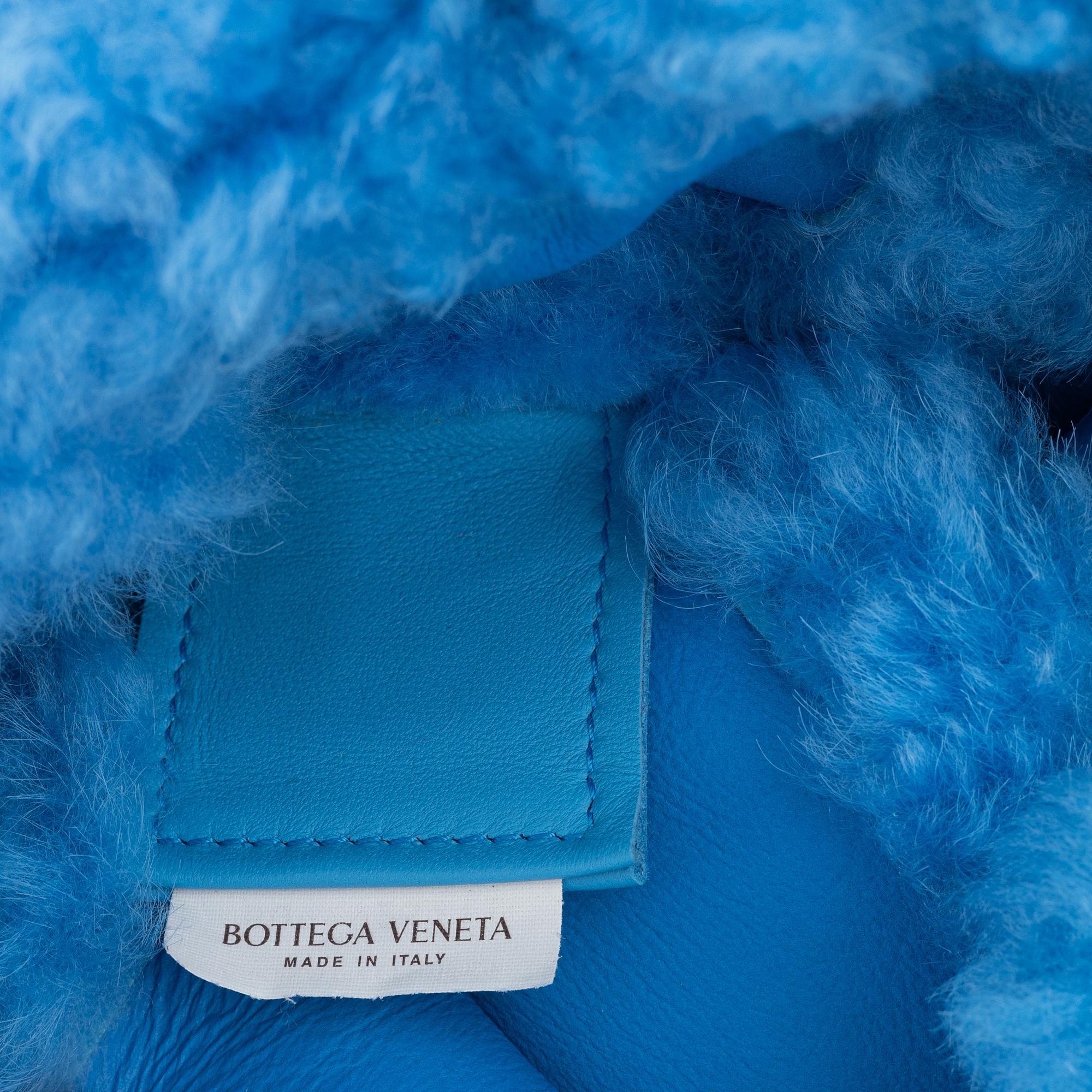 Bottega Veneta, A blue shearling intrecciato 'The Chain Tote'.